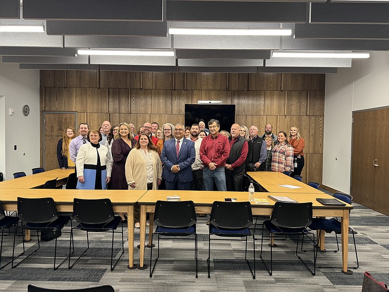 Anakin Bush/Fulton Sun
Missouri State Treasurer Vivek Malek poses for a photo with Callaway County officials after Thursday's meeting at the Callaway County Justice Center. Malek spoke about the MOBUCK$ program, which aims to assist businesses across the state.
