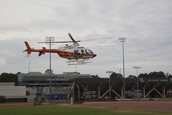 A Pafford EMS medical transport helicopter lifts off from outside Joe Aillet Stadium on Louisiana Tech University campus to transport a victim from a Monday morning stabbing incident that took place at the Lambright Sports & Wellness Center. (Photo courtesy of Caleb Daniel/Ruston Daily Leader)