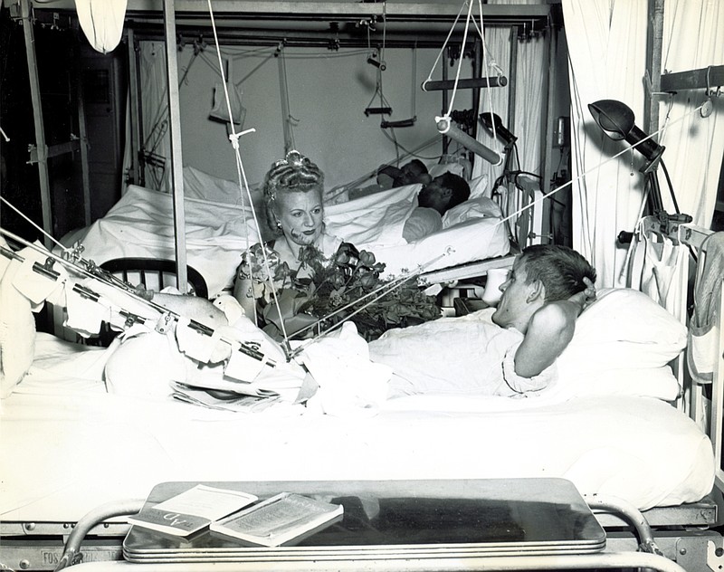 Opera star and Hot Springs resident Marjorie Lawrence visits with patients at the Army and Navy General Hospital after giving a concert at the facility. (Submitted photo courtesy of Garland County Historical Society)
