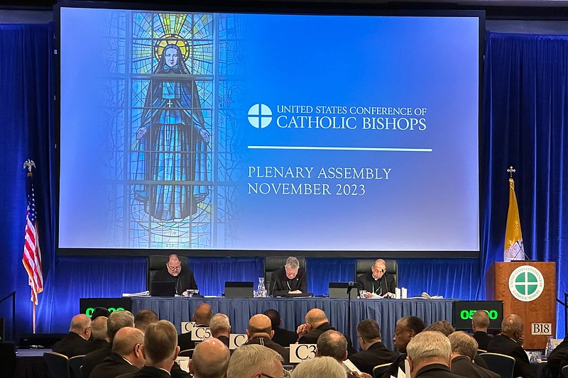 The nations Catholic bishops gather for their annual fall meeting in at the Marriott Waterfront hotel in Baltimore on Tuesday, Nov. 14, 2023. On Tuesday, the Catholic leaders called for peace in a war-torn world and unity amid strife within their own clerical ranks. (AP Photo/Tiffany Stanley)
