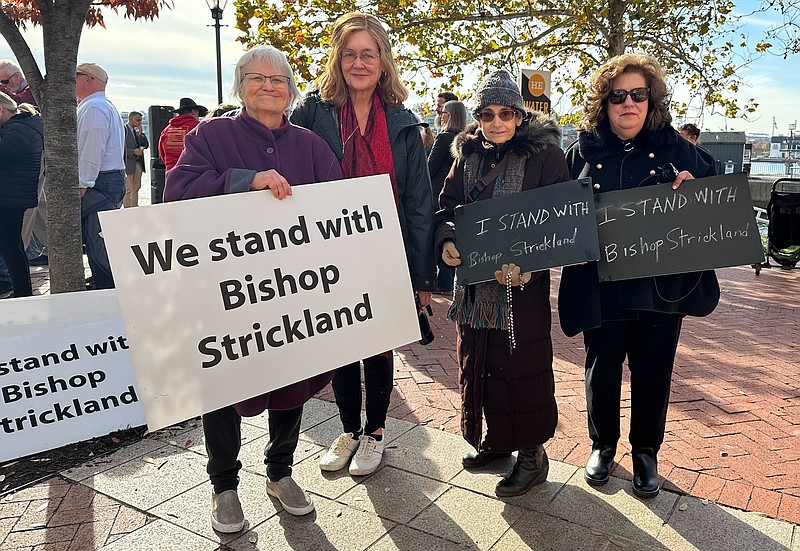 From left, Jacqueline Miller and Mary Rappaport, both from Alexandria, Va.; June Vendetti, from Bridgeport, Conn., and Suzanne Allen, from Westport, Conn., stand together for a photo in Baltimore on Wednesday, Nov. 15, 2023. They traveled to the U.S. Conference of Catholic Bishops support Bishop Joseph Strickland after his ouster. “Were in a spiritual battle. When the pope asked Bishop Strickland to resign, it was a wound to the whole church,” Allen said. Rappaport said, “this pope is trying to change the church in dangerous ways.” (AP Photo/Tiffany Stanley)
