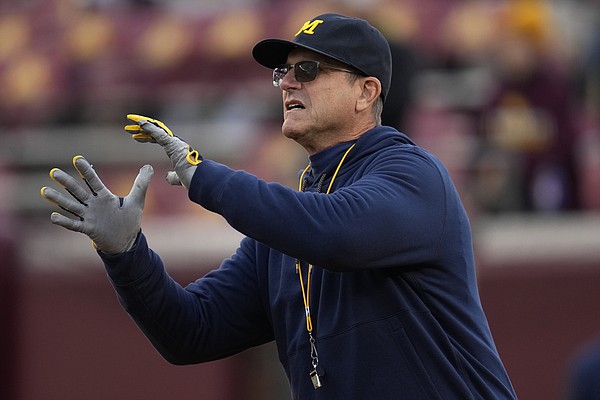 Michigan assistant fired in sign-stealing plan | The Arkansas Democrat-Gazette - Vimarsana News