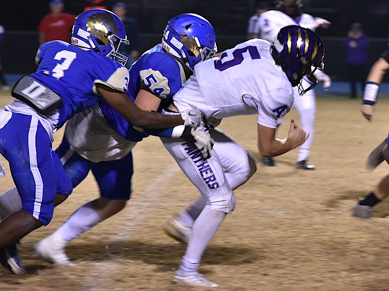 Prep Football QB Porter, Ashdown rally past DeWitt in second round