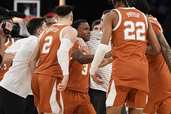Last-second shot lifts Texas | The Arkansas Democrat-Gazette - Arkansas' Best News Source - Vimarsana News
