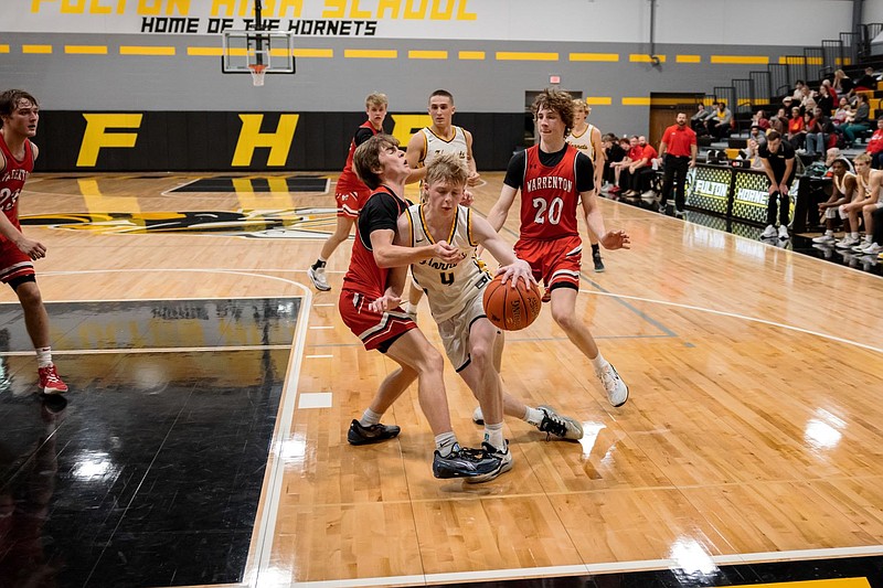 In the first basketball game in the new gym, Fulton falls to Warrenton