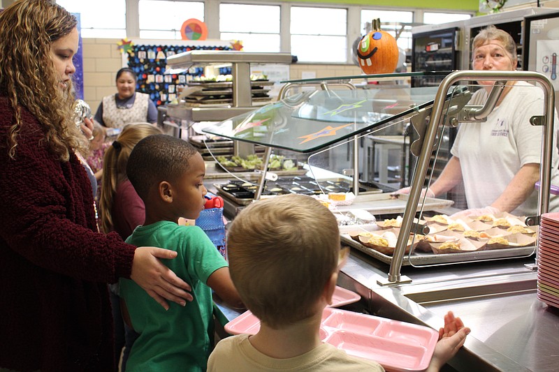 Hugh Goodwin students select their "Thanksgiving" meals at school on Nov. 16. The El Dorado School District plays a significant role in fighting food insecurity among local children. (Caitlan Butler/News-Times)