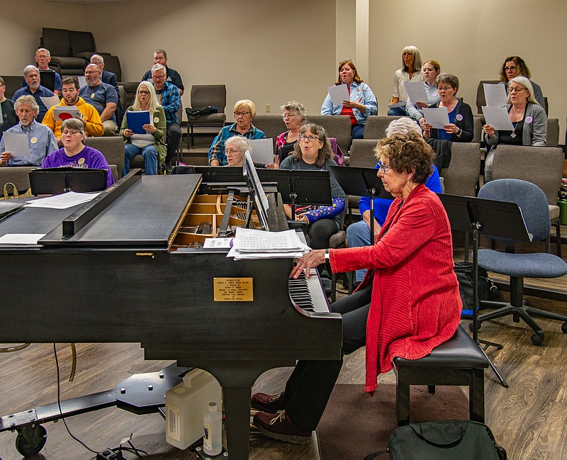 Ken Barnes/News Tribune photo: 
Jan Houser, the accompanist for the Jefferson City Cantorum for more than 30 years, plays during rehearsal for its Dec. 9, 2023, concert set for the Miller Performing Arts Center.