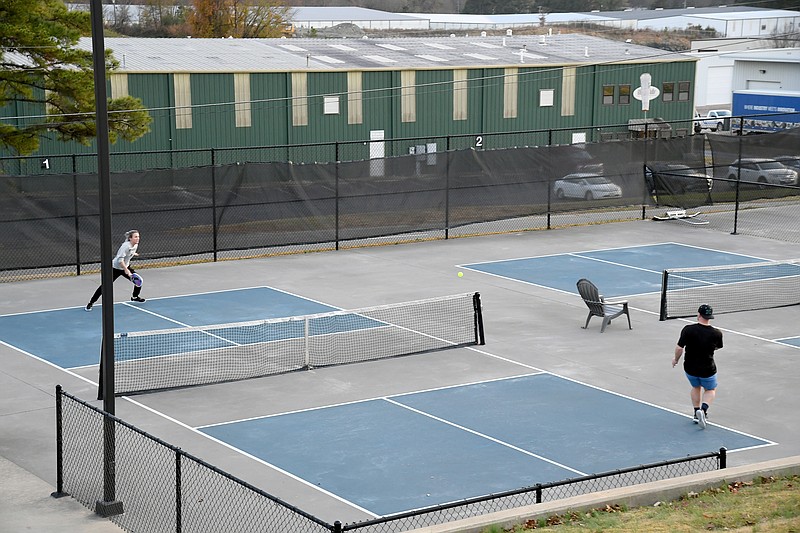 Alicia and Adam Ussery play a game of pickleball at Vulcan Pickleball Park., 736 Mid America Blvd. The park will be limited to players using only Vulcan products starting in 2024. (The Sentinel-Record/Lance Brownfield)