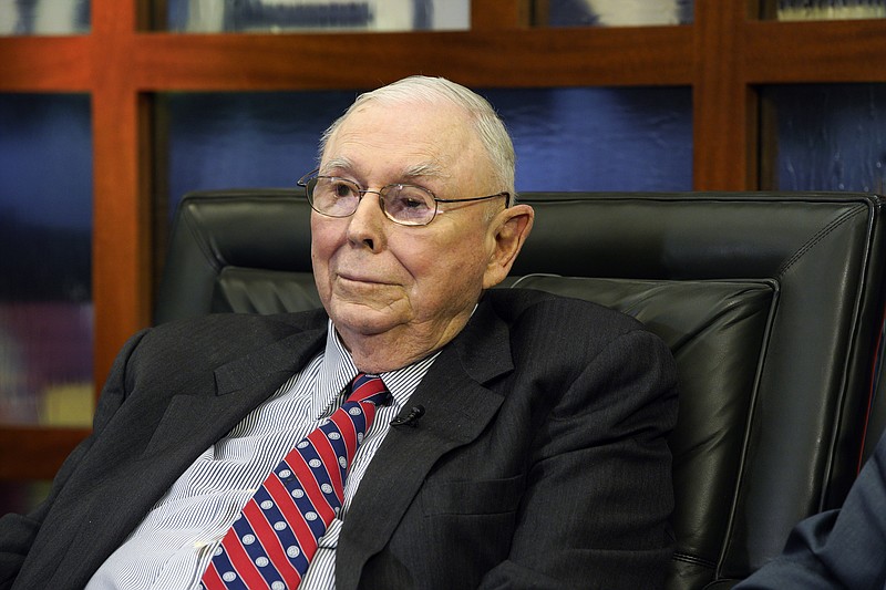 FILE - Berkshire Hathaway Vice Chairman Charlie Munger listens to a question during an interview on May 7, 2018, in Omaha, Neb. Berkshire Hathaway says Munger, who helped Warren Buffett build an investment powerhouse, has died. (AP Photo/Nati Harnik, File)
