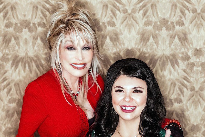 Dolly Parton, left, and Rachel Edge pose for a photo publicizing Edge's recording of "Hard Rock Candy Christmas," on which Parton is featured. Edge, from Umpire, Arkansas, also sang backup vocals on Parton's latest album, "Rockstar." (Photo courtesy of Rachel Edge)