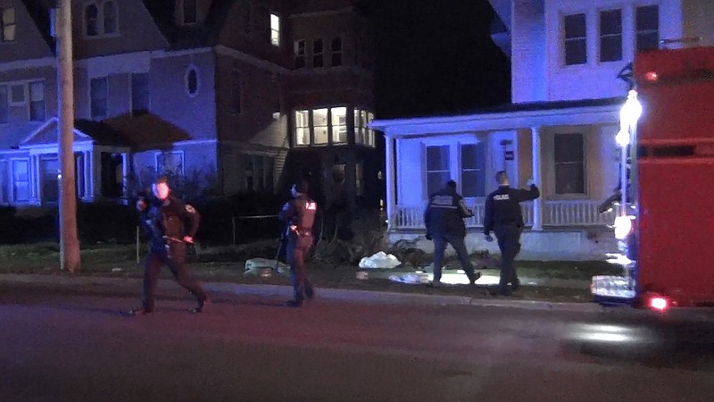 In a still frame from video law enforcement officers investigate the scene of a shooting, Saturday, Nov. 25, 2023, in Burlington, Vt. Burlington Police Department arrested Jason J. Eaton, suspected in the shooting of three young men of Palestinian descent, who were attending a Thanksgiving holiday gathering near the University of Vermont campus Saturday evening. (Wayne Savage via AP)