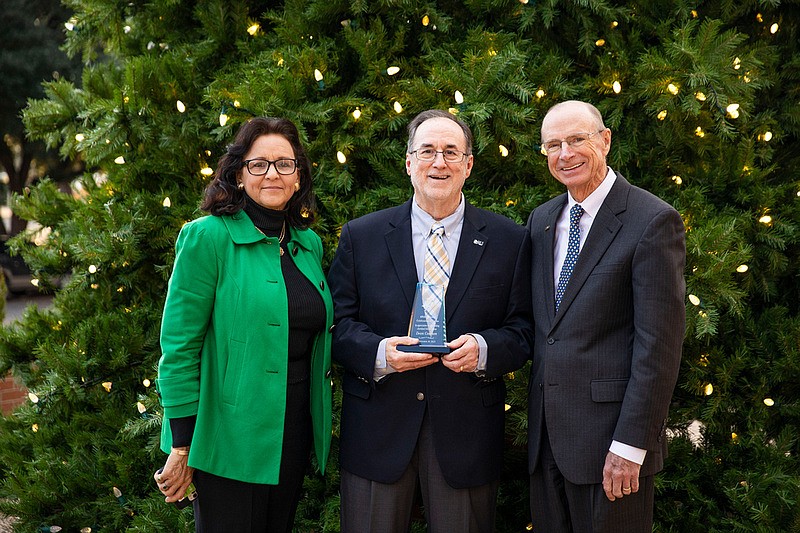 Dr. David Rankin and Dr. Donna Allen honor J Courson for establishment of SAU traditions. (Photo Contributed)