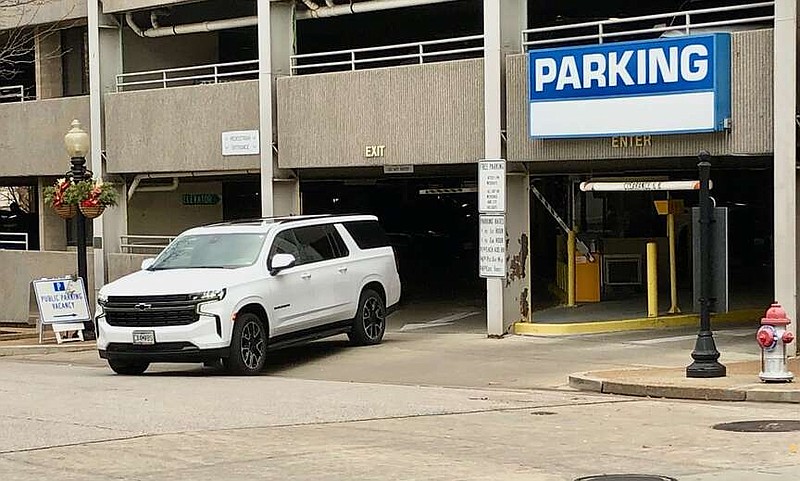 News Tribune file:
In this file photo, an SUV exits the parking garage on Madison Street. All parking rates in Jefferson City are set to go up early next year.