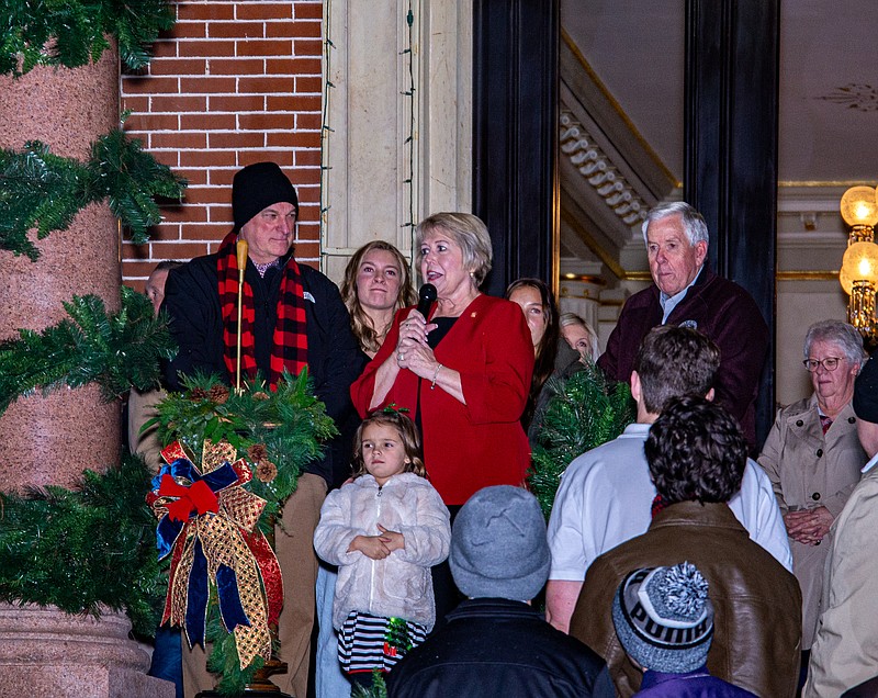 Ken Barnes/News Tribune
First lady Teresa Parson welcomes everyone to the "People's House" on Friday night for the annual lighting of the Governor's Tree and Candlelight Tours.