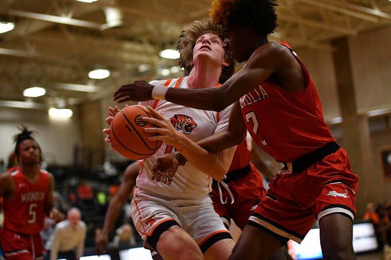 Texas High's David J. Potter looks to go up for a shot against Magnolia on Friday, Dec. 1, 2023, during the Red River Hoopfest at the Tiger Center in Texarkana, Texas. (Photo by Kevin Sutton/TXKSports.com)