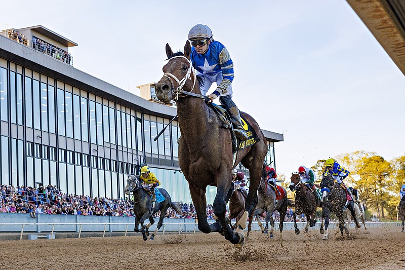 Jockey Flavien Prat on Angel Of Empire, crosses the finish line to win the 87th running of the Arkansas Derby at Oaklawn Park on April 1, 2023, in Hot Springs, Arkansas. (Wesley Hitt/Getty Images/TNS)