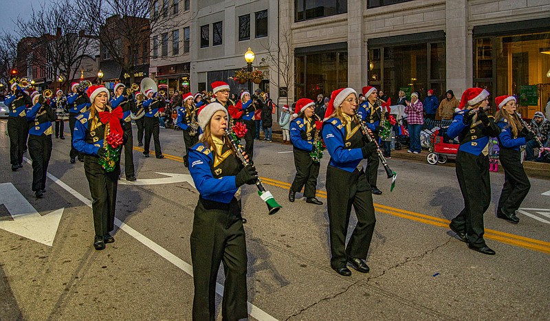 Fatima High School Marching Band leads off the annual Jaycees Christmas Parade downtown Saturday.  (Ken Barnes/News Tribune)