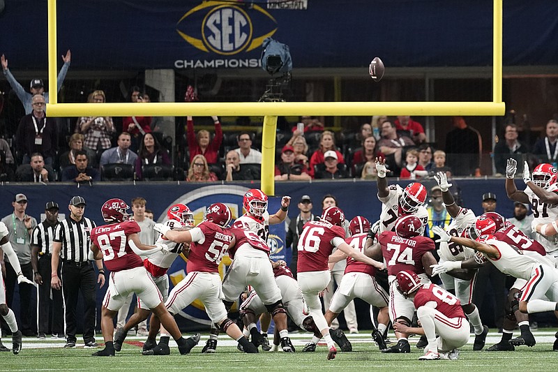 Alabama place-kicker Will Reichard (16) kicks a field goal during the second half of the Southeastern Conference championship NCAA college football game against Georgia in Atlanta, Saturday, Dec. 2, 2023. (AP Photo/Mike Stewart)