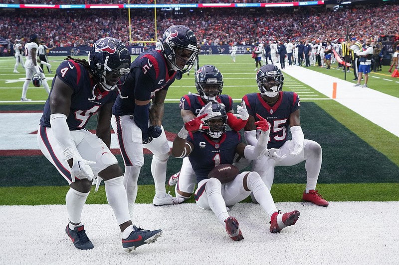 Houston Texans safety Jimmie Ward (1) celebrates his interception to stop the final drive of the Denver Broncos in the fourth quarter of an NFL football game Sunday, Dec. 3, 2023, in Houston. The Texans won 22-17. (AP Photo/Eric Gay)