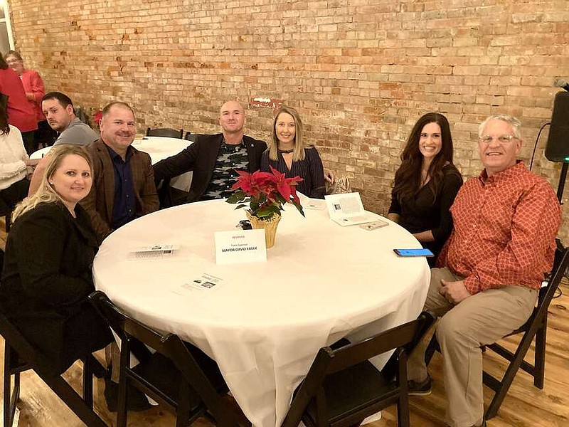 Maylon Rice/Special to Enterprise-Leader
At the Mayor's table at the Dec. 2 Past(a) for Preservation dinner were (left to right) Olivia Powell, Prairie Grove council member Chris Powell, Mayor David Faulk, first lady of Prairie Grove, Krissy Faulk, Janet Gardner and Allen Gardner.
