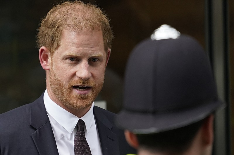 FILE - Prince Harry leaves the High Court after giving evidence in London, Tuesday, June 6, 2023. Prince Harry is challenging on Tuesday, Dec. 5, 2023, the British governments decision to strip him of his security detail after he gave up his status as a working member of the royal family and moved to the United States. The Duke of Sussex said he wants protection when he visits home and claimed it's partly because an aggressive press jeopardizes his safety and that of his family.  (AP Photo/Alberto Pezzali, File)