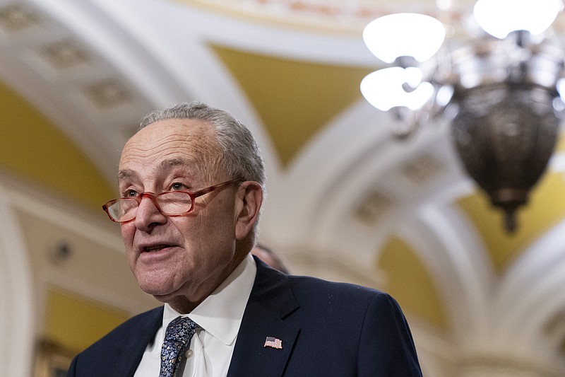 Senate Majority Leader Sen. Chuck Schumer, D-N.Y., speaks to media after a Senate Democratic policy luncheon, Tuesday, Dec. 5, 2023, on Capitol Hill in Washington. (AP Photo/Stephanie Scarbrough)