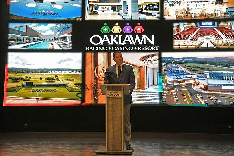 Charles Cella, the director of Southwestern Enterprises, which owns Oaklawn Racing Casino Resort, talks to Hot Springs National Park Rotary Club on Wednesday in Oaklawn's Event Center about the history of the racetrack and its efforts to stay at the forefront of racing. (The Sentinel-Record/Lance Brownfield)