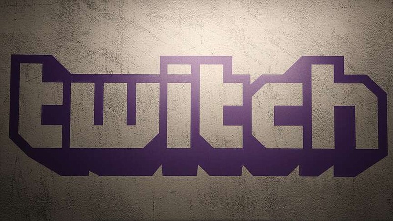 FILE - The logo for live-streaming video platform Twitch is seen on Nov. 4, 2017, at the Paris games week in Paris, France. Twitch, a popular video service, will shut down its struggling business in South Korea, a decision its chief executive blamed on allegedly “prohibitively expensive” costs for operating in the country. (AP Photo/Christophe Ena, File)