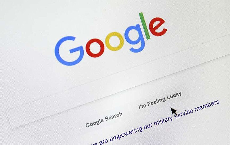 FILE - A cursor moves over Google's search engine page, in Portland, Ore., on Aug. 28, 2018. Your Google search history for 2023 has arrived. Well, actually, the world's. On Monday, Dec. 11, 2023, the California-based tech giant released its “Year in Search,” a roundup of 2023s top global queries, ranging from unforgettable pop culture moments (hello, Barbenheimer), to the loss of beloved figures and tragic news carrying worldwide repercussions. (AP Photo/Don Ryan, File)