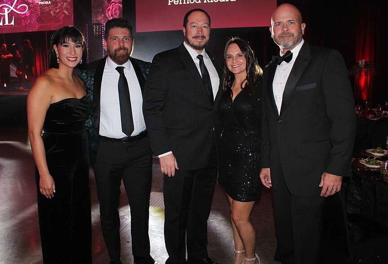 Arielle and Ben Barnet (from left), Cherokee Nation Deputy Chief Bryan Warner and wife Maco and Brian Haile gather at the Mercy Health Foundation Charity Ball on Dec. 8 at the Fort Smith Convention Center. Deputy Chief Warner announced at the benefit a gift from the Cherokee Nation to the foundation in support of a new cancer treatment center.
(NWA Democrat-Gazette/Carin Schoppmeyer)