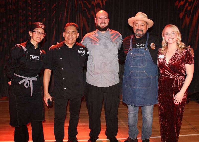 Chef Rafael Rios (second from right) is joined by Katie Robertson, curator, food and community at the Momentary (from right); Timothy Ordway, executive chef at Crystal Bridges Museum of American Art; and Geraldo Asencio and Jordan Fickle of Yeyo's, at the Tastemakers Holiday Dinner on Dec. 21 at the Momentary in Bentonville.
(NWA Democrat-Gazette/Carin Schoppmeyer)
