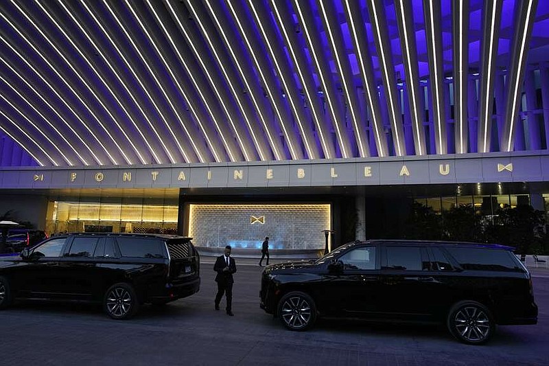 A driver walks to his car in the porte cochere ahead of the official opening of the Fontainebleau Las Vegas hotel-casino Tuesday, Dec. 12, 2023, in Las Vegas. (AP Photo/John Locher)