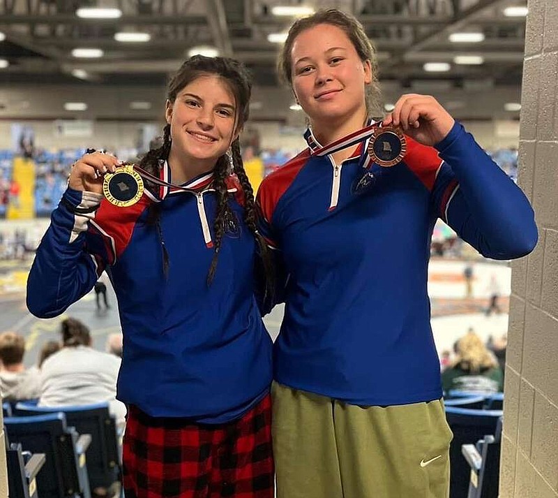 (Photo submitted by Lance Fulks)
Camryn Wingate (left) won the 105 pound bracket with a 6-0 record and Ivy Scroggins (right) won fifth place in the 170 pound bracket with a record of 3-2 at the Battle of the Katy Trail last weekend.