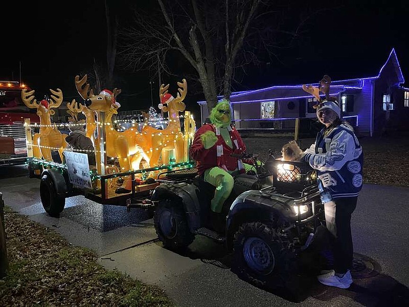 Kaden Quinn/News Tribune photo:
A local family brings the Grinch's stable of reindeer to the Jamestown Lions Club Christmas parade on Saturday, Dec. 16, 2023.