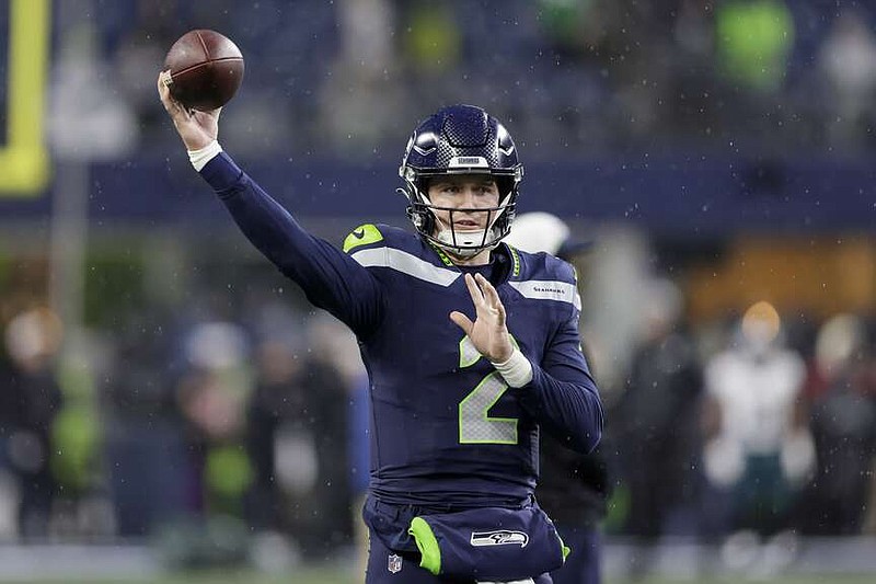 Seattle Seahawks quarterback Drew Lock works out prior to an NFL football game against the Philadelphia Eagles, Monday, Dec. 18, 2023, in Seattle. (AP Photo/John Froschauer)