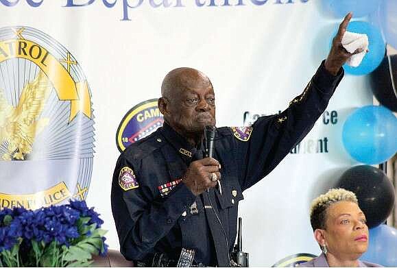 93-year-old police officer L.C. Buckshot Smith addresses the crowd at his retirment ceremony from the Camden Police Department. Photo by Michael Hanich.