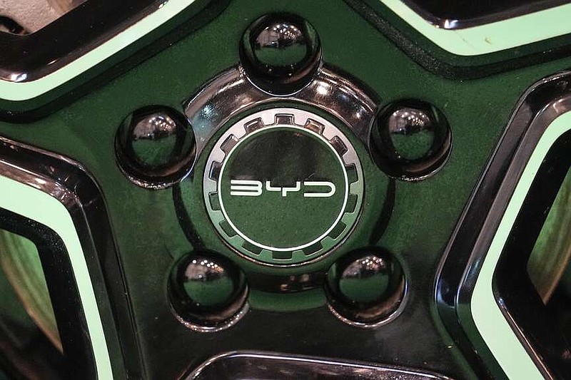 FILE - The wheels of an electric car of Chinese car maker BYD is on display at the Essen Motor Show in Essen, Germany, Friday, Dec. 1, 2023. Chinese automaker BYD said Friday, Dec. 22, that it plans to build a new electric vehicle plant in Hungary, its first car factory in Europe, as part of its rapid global expansion.(AP Photo/Martin Meissner, File)