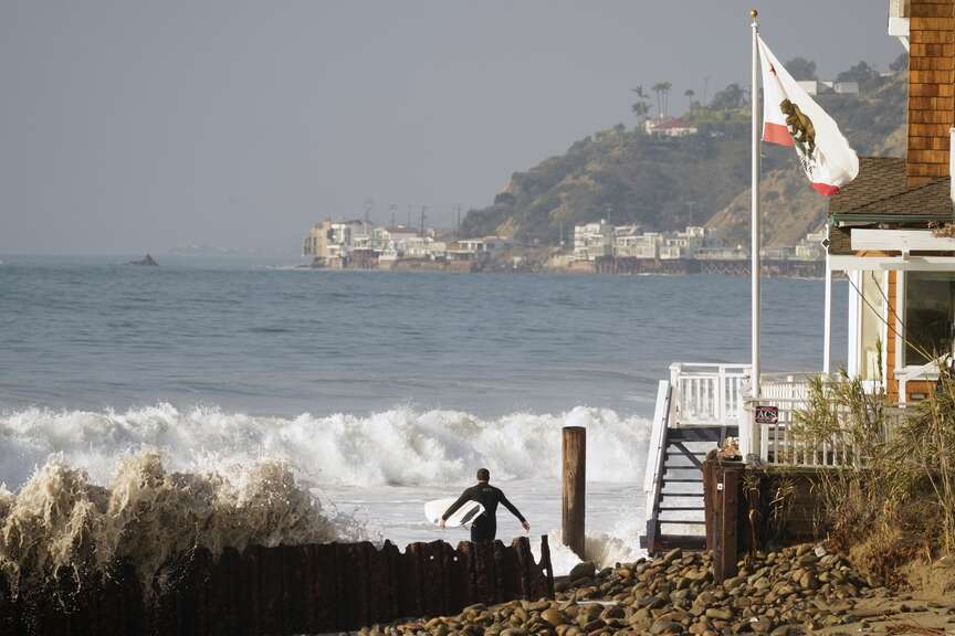 Pacific waves put coast cities on alert