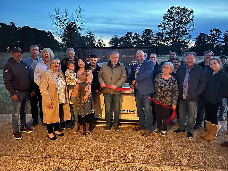 Courtesy photo
Greg Winters of GSW Power Solutions cuts the ribbon for his business in a Business After Hours event hosted by the Camden Area Chamber of Commerce.