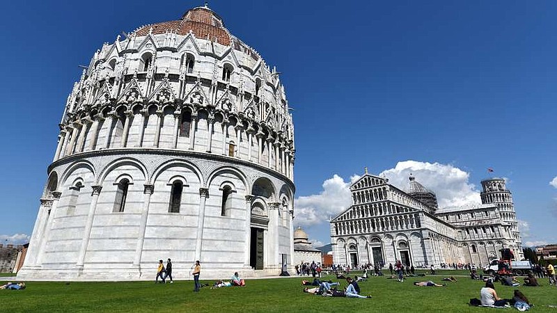 On the Field of Miracles, Pisa's Baptistery is Italy's biggest, with interior ambience, a hexagonal pulpit and impressive acoustics.