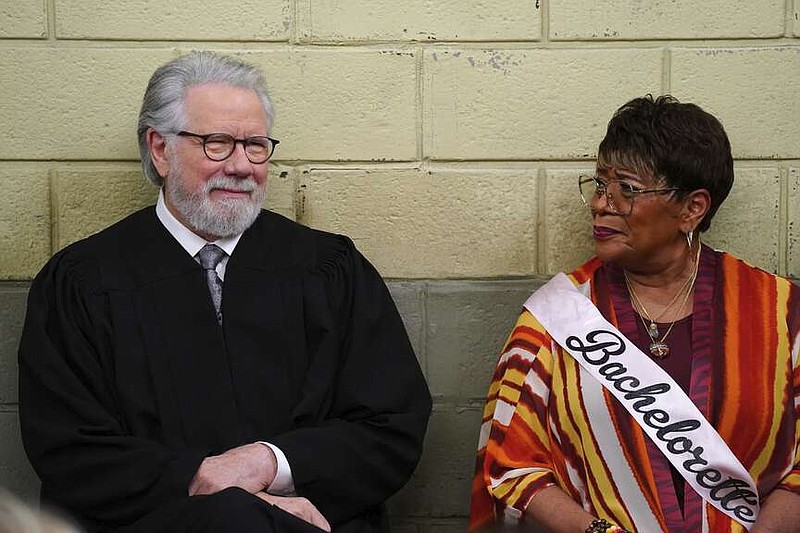 This image released by NBC shows John Larroquette as Dan Fielding, left, and Marsha Warfield as Roz in a scene from the "Night Court" episode entitled "The Roz Affair." (Nicole Weingart/NBC via AP)