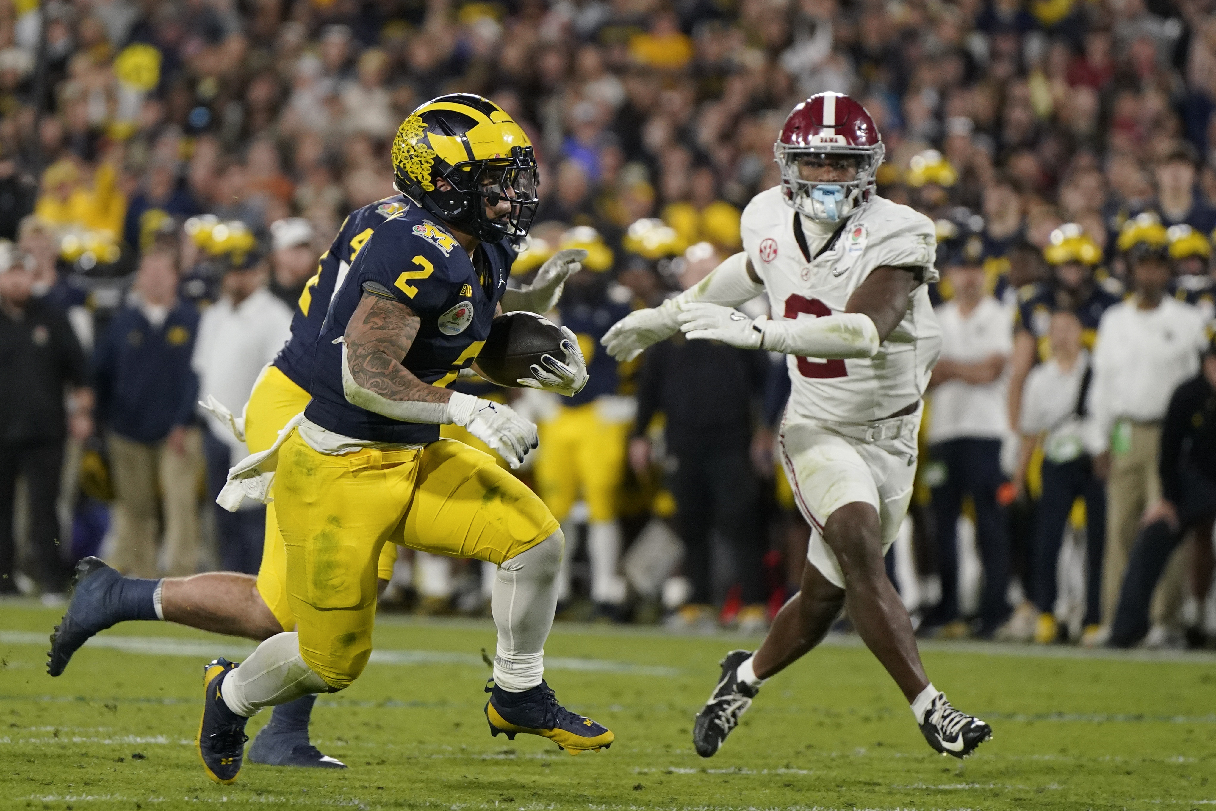 Blake Corum bounces back from knee injury leads Michigan to brink