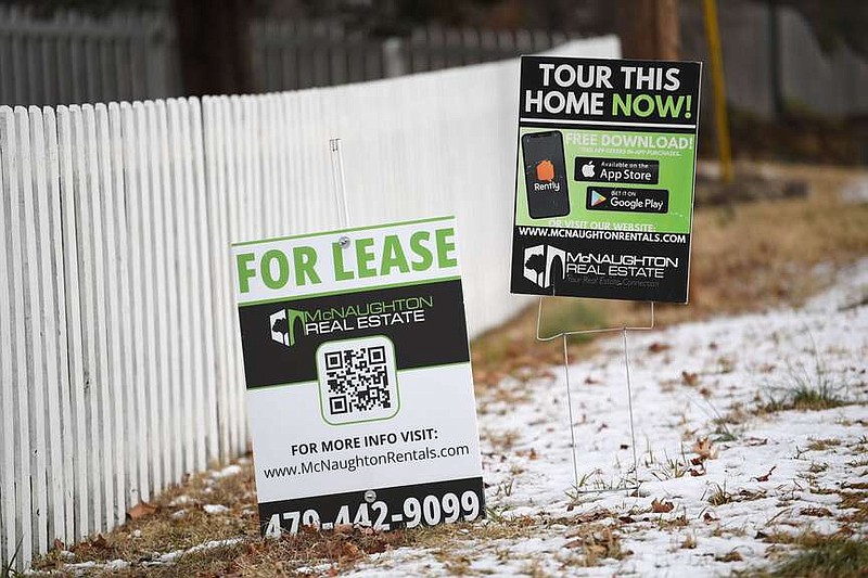 Signs advertising a house for lease are seen Friday, Jan. 5, 2024, outside the property at  134 E. North St. in Fayetteville. According to RentCafe, a nationwide apartment search website, Northwest Arkansas has the nation's most competitive small rental market. Visit nwaonline.com/photo for today's photo gallery.
(NWA Democrat-Gazette/Andy Shupe)