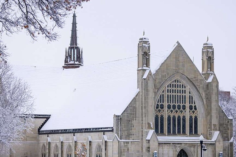 The Chambers Protestant Chapel at Boys Town roof is covered in snow on Tuesday, Jan. 9, 2024 in Omaha, Neb.   (Anna Reed/Omaha World-Herald via AP)