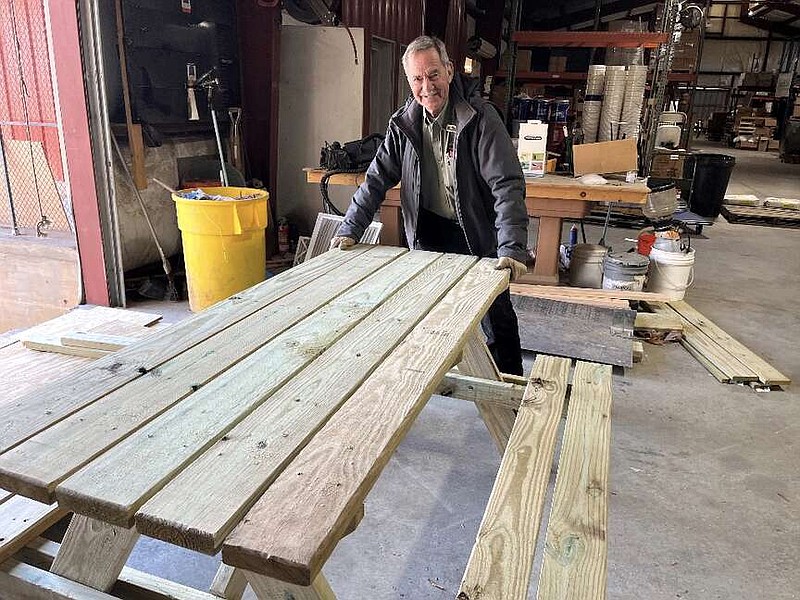 The table was built by volunteers called the “Over the Hill Gang,” a group of retired woodworkers who build special projects for area organizations and community groups at their Ferncliff facility. (Submitted photo)