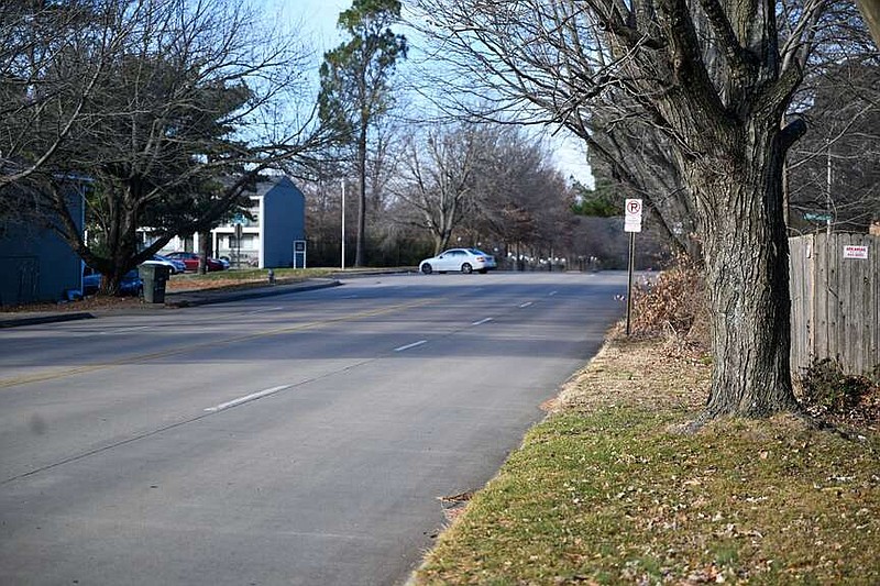 Drake Street between College Avenue and Gordon Long Park is seen on Wednesday, Dec. 13, 2023, in Fayetteville. A project to build a two-way protected trail along the stretch, along with a bridge over Scull Creek, is on the city's plan for next year. Visit nwaonline.com/photo for today's photo gallery. (NWA Democrat-Gazette/Caleb Grieger)