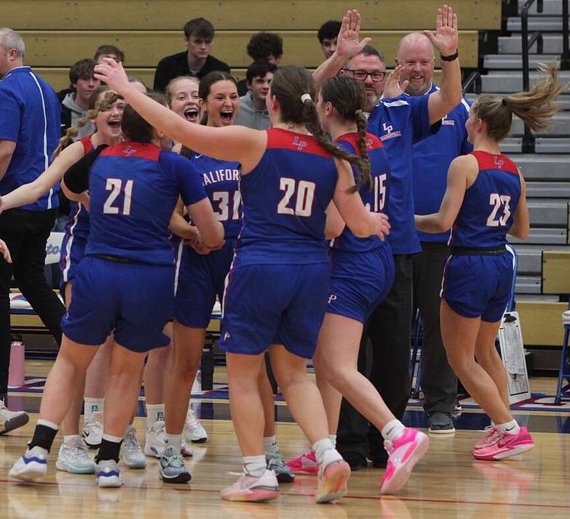 (Democrat photo/Evan Holmes)
The Lady Pintos celebrate a 53-49 victory over the St. James Lady Tigers in the California Tournament on Thursday. They will play for the tournament title against Columbia-Battle at a TBD date.
