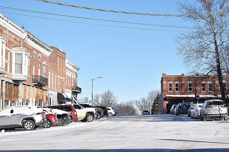 Democrat photo/Garrett Fuller — As temperatures dipped into the negatives and snow continued to fall, Moniteau County and City of California road crews were busy over the past week clearing and treating roads for safe travel.