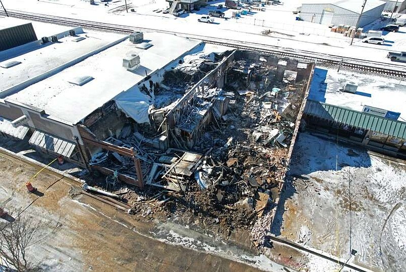 Damage from an overnight fire to the Patticakes Bakery in downtown Conway can be seen in this Tuesday, Jan. 16, 2024 photo. (Arkansas Democrat-Gazette/Colin Murphey)