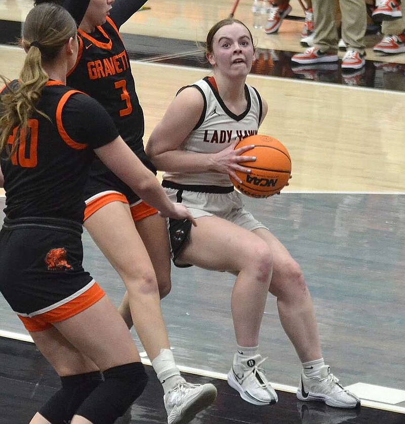 Annette Beard/Pea Ridge TIMES
The Pea Ridge Lady Blackhawks hosted the Gravette Lady Lions Thursday, Jan. 18, in a make-up game. Senior Leah Telgemeier, No. 2, looks for an opening to shoot a basket. She had 6 points for the home team. For more photographs, go to the PRT gallery at https://tnebc.nwaonline.com/photos/.